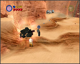 Use the Dark Side on a pile of black bricks left of your starting location - Jabba's Palace - Freeplay Mode - Episode VI - LEGO Star Wars II: The Original Trilogy - Game Guide and Walkthrough
