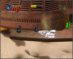 When you're by the mechanism at the front of the barge, use the Dark Side on the crate to create a grapple point - The Great Pit of Carkoon - Freeplay Mode - Episode VI - LEGO Star Wars II: The Original Trilogy - Game Guide and Walkthrough