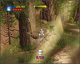After going through the two wooden gates, use the tunnel (behind the bushes) and as R2 fly to the minikit nearby - The Battle of Endor - Freeplay Mode - Episode VI - LEGO Star Wars II: The Original Trilogy - Game Guide and Walkthrough