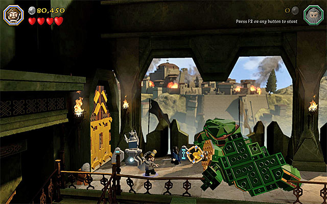 You need to aim at the fallen pillar - Stage 1 (Greatest Kingdom in Middle-Earth): Smaugs attack - Walkthrough - LEGO The Hobbit - Game Guide and Walkthrough