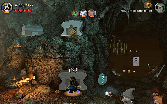 Walk through the bottom manhole to reach the ledge with the chest - Stage 5 (The Troll Hoard): Explore the cave - Walkthrough - LEGO The Hobbit - Game Guide and Walkthrough