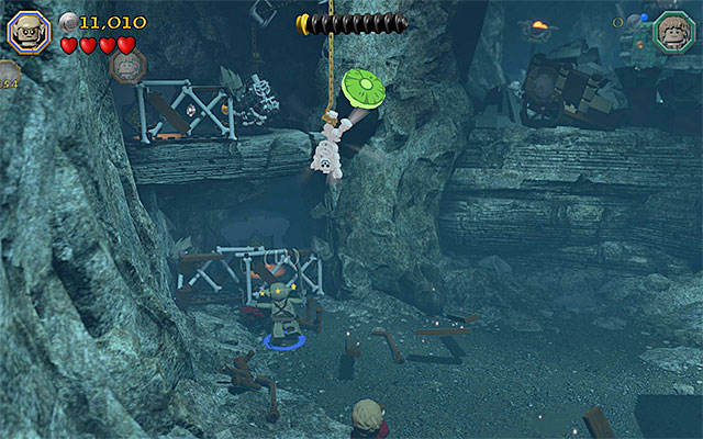 The fence with a passage behind it - Stage 7 (Goblin-town): Cooperation with a goblin - Walkthrough - LEGO The Hobbit - Game Guide and Walkthrough