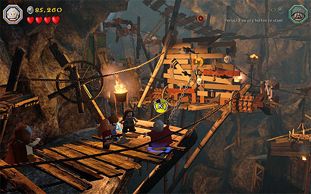 Reach the catch and lower the bridge - Stage 7 (Goblin-town): Escape from the goblin city - Walkthrough - LEGO The Hobbit - Game Guide and Walkthrough