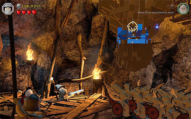 Drop down the boulder and set it into motion - Stage 7 (Goblin-town): Escape from the goblin city - Walkthrough - LEGO The Hobbit - Game Guide and Walkthrough