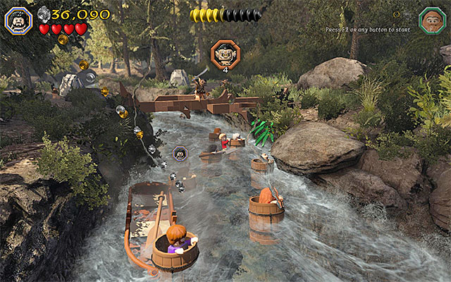 Collect the studs hovering above the surface of the river - Stage 11 (Barrels Out of Bond): Go down the river - Walkthrough - LEGO The Hobbit - Game Guide and Walkthrough