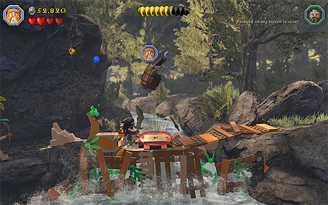 The spot where you need to destroy a wooden bridge - Stage 11 (Barrels Out of Bond): Go down the river - Walkthrough - LEGO The Hobbit - Game Guide and Walkthrough