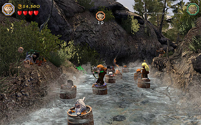 Use the bow to eliminate goblins on both sides of the river - Stage 11 (Barrels Out of Bond): Go down the river - Walkthrough - LEGO The Hobbit - Game Guide and Walkthrough