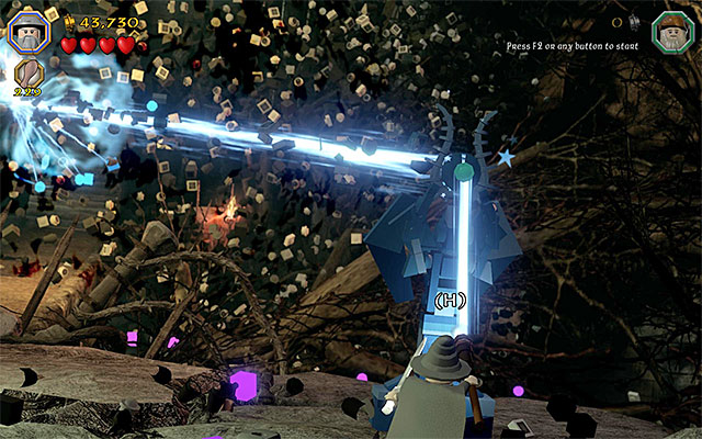 This is not it, however, because in the initial part of this stage, you need to send a magic projectile towards the recently built tower - Stage 14 (The Necromancer): The battle with Sauron - Walkthrough - LEGO The Hobbit - Game Guide and Walkthrough