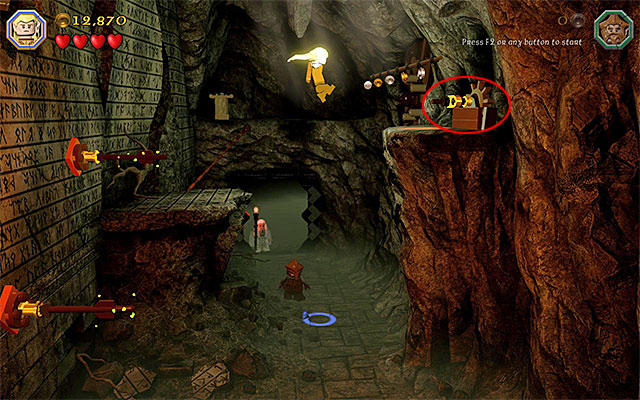 The second knob is on the ledge high above shown in the above screenshot, which is located in the right side of the cave - Stage 3 (Azog the Defiler) - Main Stages - Collectibles - LEGO The Hobbit - Game Guide and Walkthrough