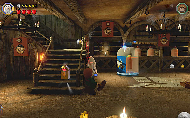 Check out the area under the stairs - Stage 9 (Queer Lodgings) - Main Stages - Collectibles - LEGO The Hobbit - Game Guide and Walkthrough