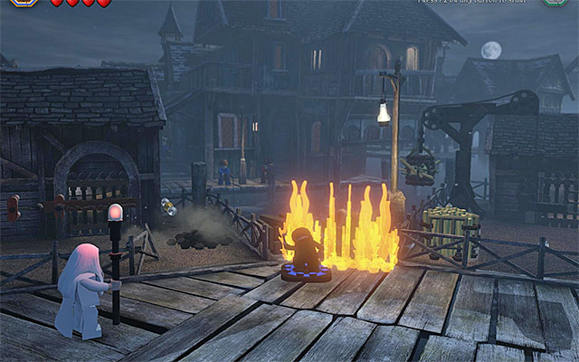 walk onto the plate and set the objects here on fire - Stage 12 (A Warm Welcome) - Main Stages - Collectibles - LEGO The Hobbit - Game Guide and Walkthrough
