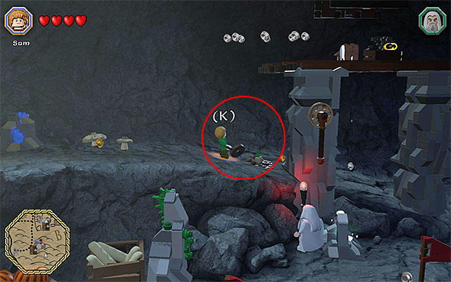 Smash the objects at the bottom level of the left part of the cave - Mithril bricks locations (1-15) - Middle Earth - Mithril LEGO bricks - LEGO The Hobbit - Game Guide and Walkthrough