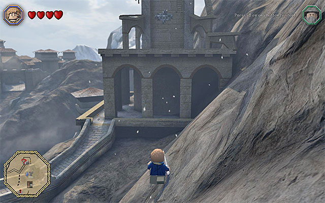 The second variant assumes that you climb the short tower shown in the above screenshot, within close range of the marker for the bonus level (to the South-East of it) - Bonus level - LEGO The Hobbit - Game Guide and Walkthrough