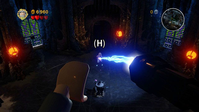 You will begin the fight with Saruman while hanging in the air - keep pressing (H) to protect yourself from the wizard's lightning attacks - The Black Rider - Walkthrough - Act I - LEGO The Lord of the Rings - Game Guide and Walkthrough