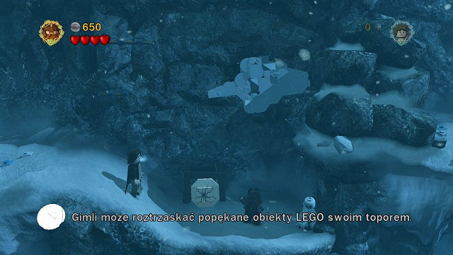 On the other side of the deep snow you will find a broken LEGO tile which Gimli can break to pieces with his axe - The Pass of Caradhras - Walkthrough - Act I - LEGO The Lord of the Rings - Game Guide and Walkthrough