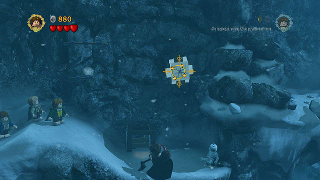You will reach a small cave with another cracked LEGO tile - this time it's on the ground - The Pass of Caradhras - Walkthrough - Act I - LEGO The Lord of the Rings - Game Guide and Walkthrough