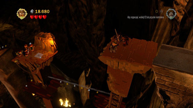 Run down the stairs and you will pass by a statue which you can use to save your game - The Mines of Moria - Walkthrough - Act I - LEGO The Lord of the Rings - Game Guide and Walkthrough