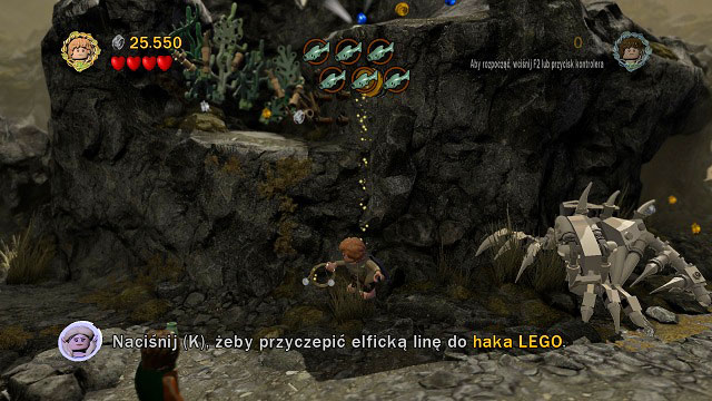 The third fish can be found high above, on a rock ledge - Taming Gollum - Walkthrough - Act II - LEGO The Lord of the Rings - Game Guide and Walkthrough