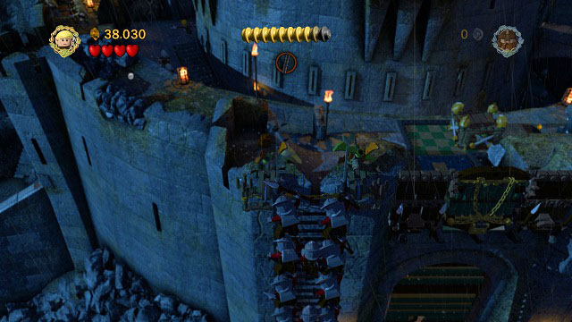 The action will move to the wall above the gate - Helm's Deep - Walkthrough - Act II - LEGO The Lord of the Rings - Game Guide and Walkthrough