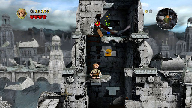 Build a springboard from the LEGO bricks on the ground and use it to reach the first floor of the tower - Osgiliath - Walkthrough - Act II - LEGO The Lord of the Rings - Game Guide and Walkthrough
