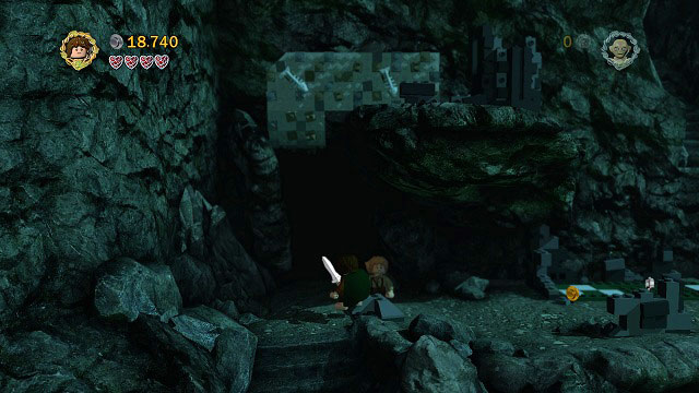 Use the phial of Galadriel to light the dark area in front of you, unveiling a wall which can be climbed by Gollum - The Secret Stairs - Walkthrough - Act III - LEGO The Lord of the Rings - Game Guide and Walkthrough