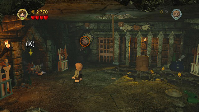 Deal with the Orcs stationed here, switch to Frodo and use his phial to light the portal on the left side of the room - Cirith Ungol - Walkthrough - Act III - LEGO The Lord of the Rings - Game Guide and Walkthrough