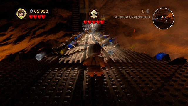 Driven with temptation, Frodo puts the ring onto his finger - Mount Doom - Walkthrough - Act III - LEGO The Lord of the Rings - Game Guide and Walkthrough