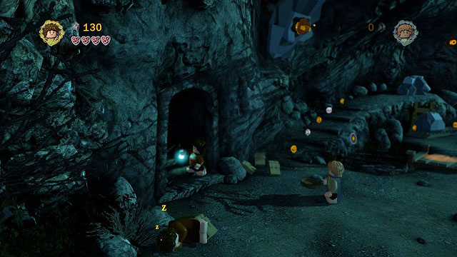 On the right side of the first location, beside the sleeping Hobbit you can find a dark cave - Weathertop - Collectibles - LEGO The Lord of the Rings - Game Guide and Walkthrough