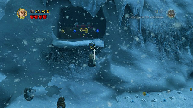 A bit behind the avalanche, after jumping across the gulf, you should see a hook on the wall - The Pass of Caradhras - Collectibles - LEGO The Lord of the Rings - Game Guide and Walkthrough