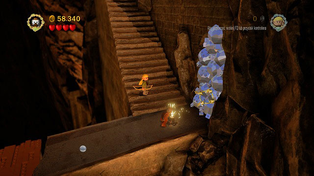 As you're going down the stairs, you will come across a wall built of mithril rocks - The Mines of Moria - Collectibles - LEGO The Lord of the Rings - Game Guide and Walkthrough
