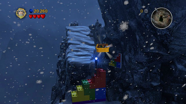 In the spot where you build a ramp from coloured bricks, at first you should construct it in accordance with the pictogram on the wall and a chest will appear on top - Taming Gollum - Collectibles - LEGO The Lord of the Rings - Game Guide and Walkthrough