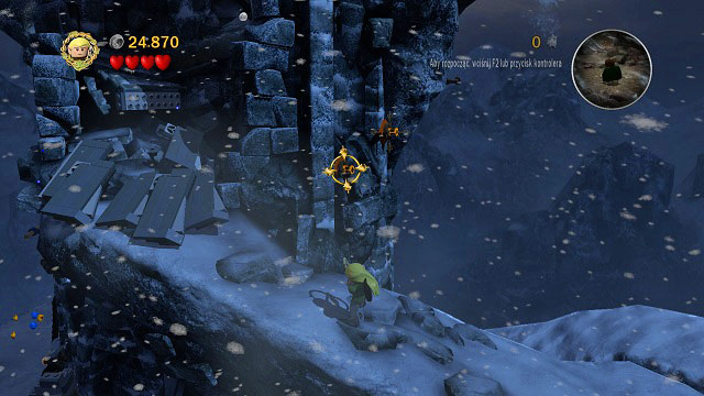 As you reach the bottom of the tower, on its outer wall on the right you should see some targets - Taming Gollum - Collectibles - LEGO The Lord of the Rings - Game Guide and Walkthrough