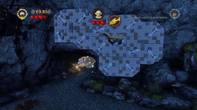 During the fight with Gollum, enter the dark cave below him, change the second character to the Berserker and destroy the mithril bricks - Taming Gollum - Collectibles - LEGO The Lord of the Rings - Game Guide and Walkthrough