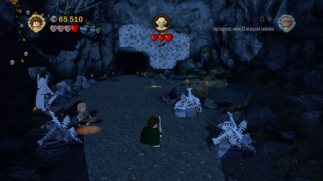 During the fight with Gollum, you have to destroy three piles of fish-bones beside the save point and afterwards build a chest from their remains - Taming Gollum - Collectibles - LEGO The Lord of the Rings - Game Guide and Walkthrough