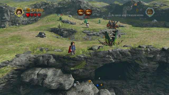 Head towards the camera and you should find a dark cave in the middle of the map, below the cliff - Warg Attack - Collectibles - LEGO The Lord of the Rings - Game Guide and Walkthrough