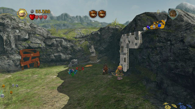 Nearby the savepoint there is a wall which can be climbed by Gollum - Warg Attack - Collectibles - LEGO The Lord of the Rings - Game Guide and Walkthrough