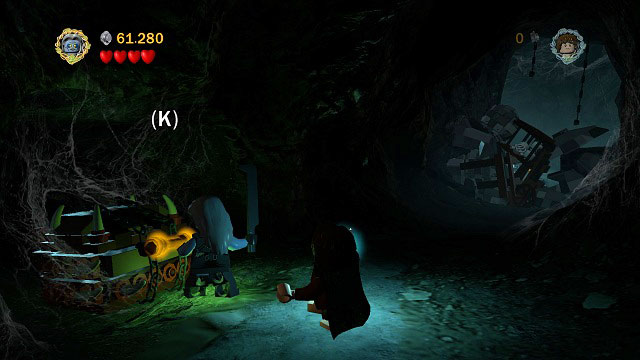 Head further into the tunnel and on its left side you should see an orange handle - Secret Stairs - Collectibles - LEGO The Lord of the Rings - Game Guide and Walkthrough
