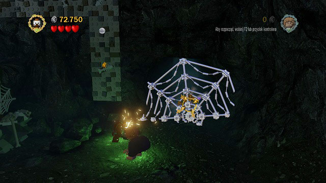 In the next big room which you come across, right beside the climbing wall you should see a mithril spider-web - Secret Stairs - Collectibles - LEGO The Lord of the Rings - Game Guide and Walkthrough