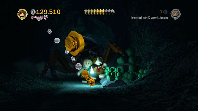 As you're running away from Shelob, you need to follow the trail of studs and break three piles of skulls (just do the following: go maximally to the right, to the left and back to the right side of the screen) - Secret Stairs - Collectibles - LEGO The Lord of the Rings - Game Guide and Walkthrough