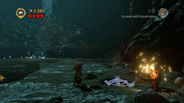 As you're fighting Shelob, on the right side of the arena you can find a mithril spider-web covering the bottom of the chest - blow it up and collect the Minikit - Cirith Ungol - Collectibles - LEGO The Lord of the Rings - Game Guide and Walkthrough