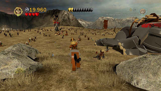 During the charge, from the moment you see a falling Mumakil, you have to keep throwing spears - the third Minikit is in a chest at the very end and should automatically fall into your hands - Battle of Pelennor Fields - Collectibles - LEGO The Lord of the Rings - Game Guide and Walkthrough