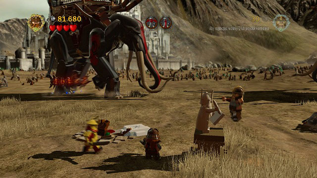 To the left of the save point there is a cracked LEGO brick - Battle of Pelennor Fields - Collectibles - LEGO The Lord of the Rings - Game Guide and Walkthrough