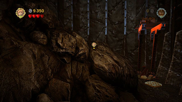 Use the rope on it to unlock a passage - head to the left and search for the Design (it's in the area showed in the above screenshot) - The Black Gate - Collectibles - LEGO The Lord of the Rings - Game Guide and Walkthrough