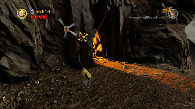 Beside the gate you will find a target for Legolas - shoot it with his bow and jump to the Design using the therefore created bar - Mount Doom - Collectibles - LEGO The Lord of the Rings - Game Guide and Walkthrough