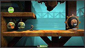 After getting to the lowest platform, go to the furthest layer and move left - here you will find a secret passage and a bubble with glasses (hidden behind the books) - needed to activate the image on the first level - Grab and Swing - Da Vinci's Hideout - LittleBigPlanet 2 - Game Guide and Walkthrough
