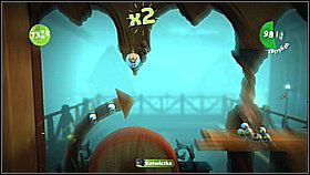 A bit further you will reach a rotating wheel - high above it there's an item bubble - Grab and Swing - Da Vinci's Hideout - LittleBigPlanet 2 - Game Guide and Walkthrough