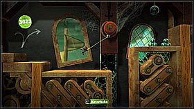 Upstairs, move right using the rolls which you can hook to - Gripple Grapple - Da Vinci's Hideout - LittleBigPlanet 2 - Game Guide and Walkthrough