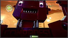 Run up the forearm and bounce off the launch pads on the fist - Where in the World is Avalon Centrifuge - The Cosmos - LittleBigPlanet 2 - Game Guide and Walkthrough