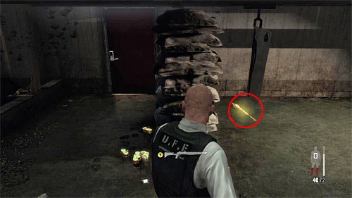 Walk round the bags with sand, and youll find the last part of a weapon in this chapter [Golden Gun - LAW 3/3] - Chapter XIII - p. 5 - Walkthrough - Max Payne 3 - Game Guide and Walkthrough