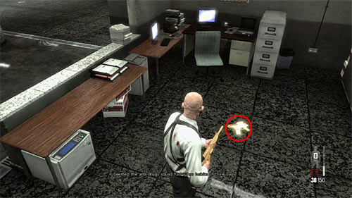 SECRET 10 [Golden Gun - G6 Commando Rifle 2/3]: Behind the desk in small area with elevators and security room - Clues and Golden Guns - Chapter XIII - Collectibles - Max Payne 3 - Game Guide and Walkthrough